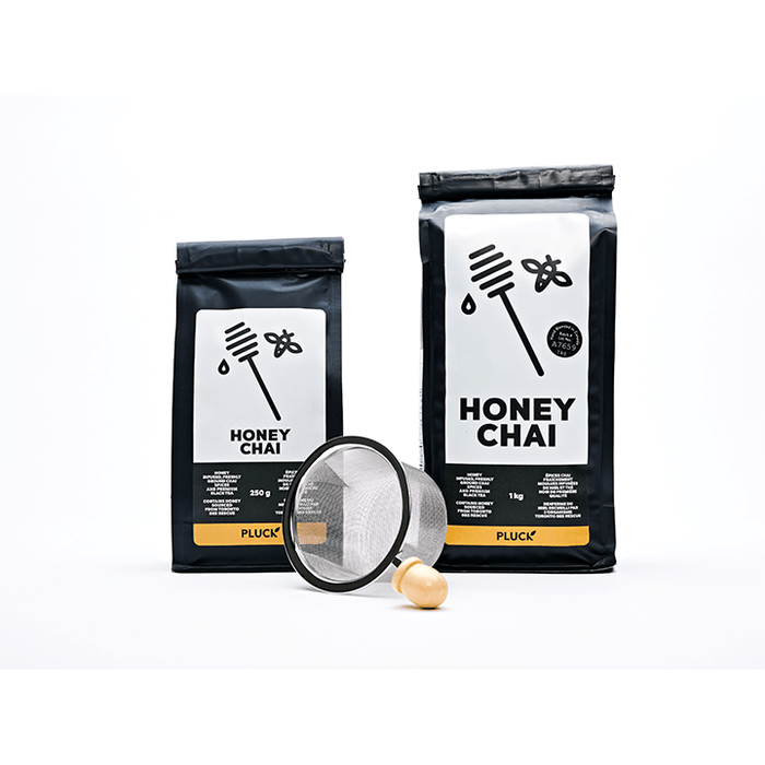 Pluck Honey Chai packaging with metal strainer
