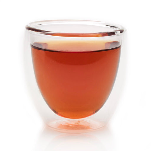 steeped English Breakfast black tea in glass cup