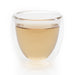 steeped ginger root herbal tea in glass cup