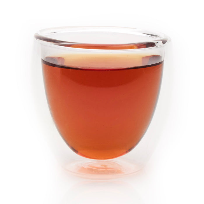 steeped Earl Grey Cream rooibos tea in glass cup